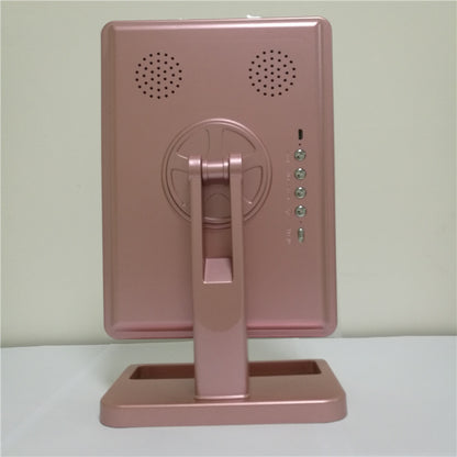 Touch screen makeup mirror with speaker featuring LED lights and a side magnifying mirror in stylish pink design.