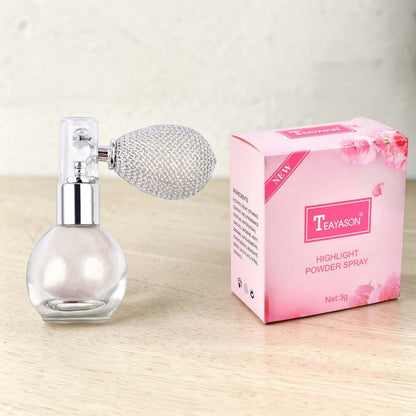 Teayasón highlight powder spray in a glass bottle with a unique pump design and pink floral packaging.