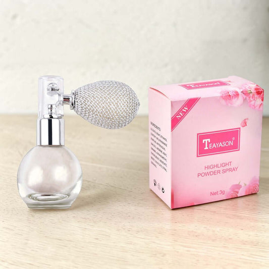 Teayasón highlight powder spray in a glass bottle with a unique pump design and pink floral packaging.