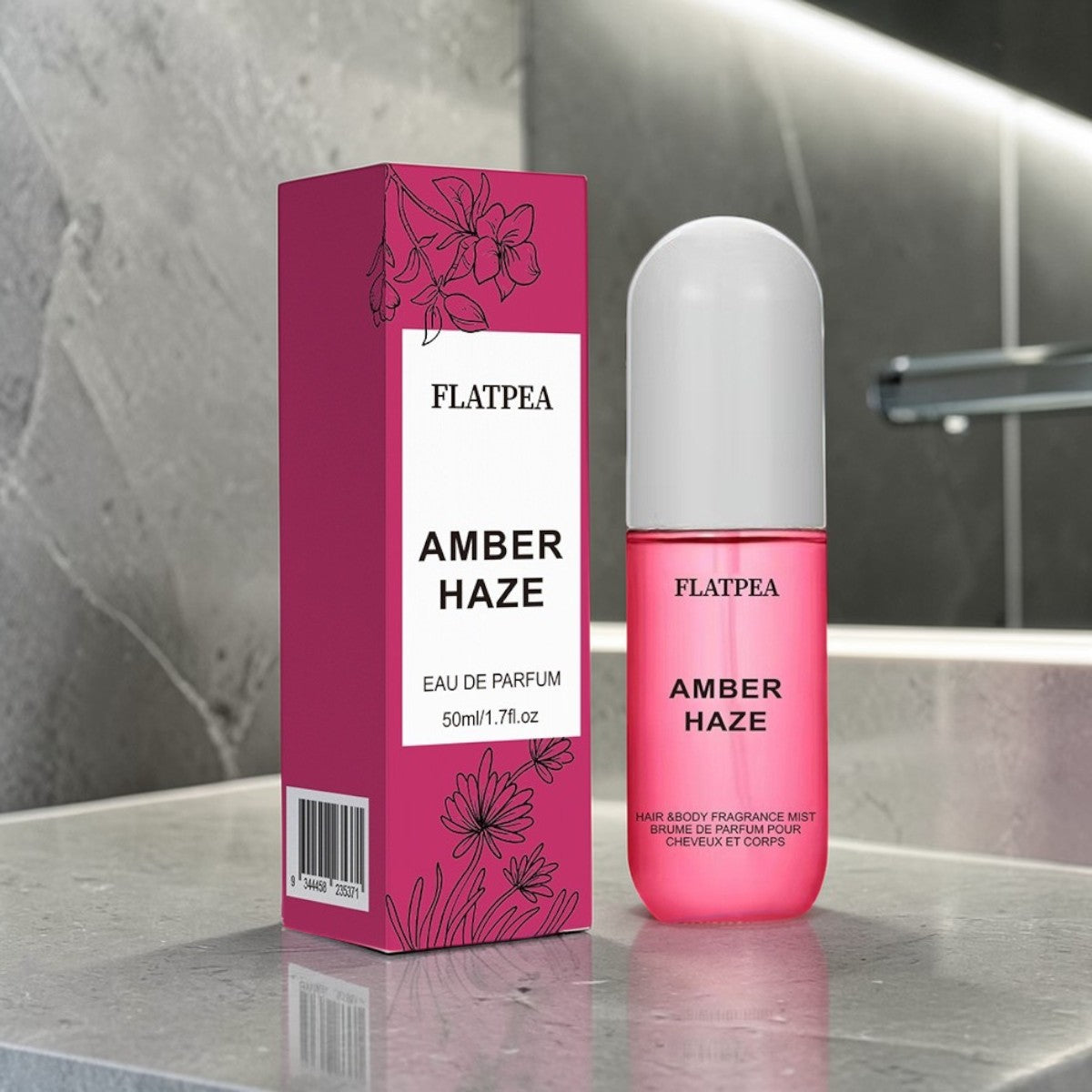 Fragrance spray and body perfume Amber Haze with floral packaging on a modern bathroom counter.
